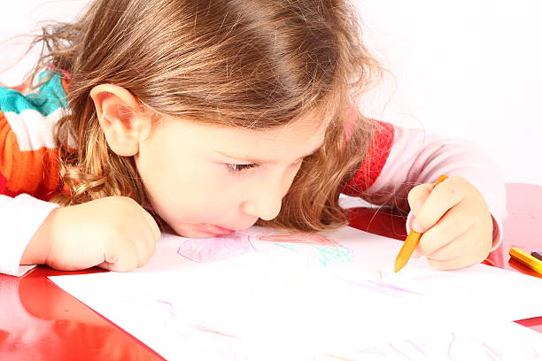 istock Little girl looking for a drawing 518040763