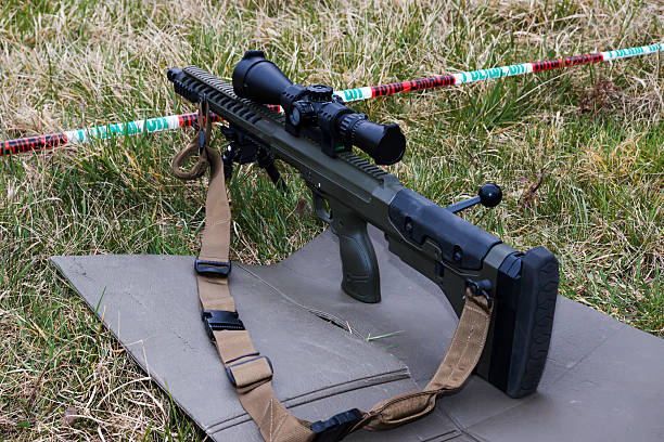 istock Military sniper aims at a target 518055446