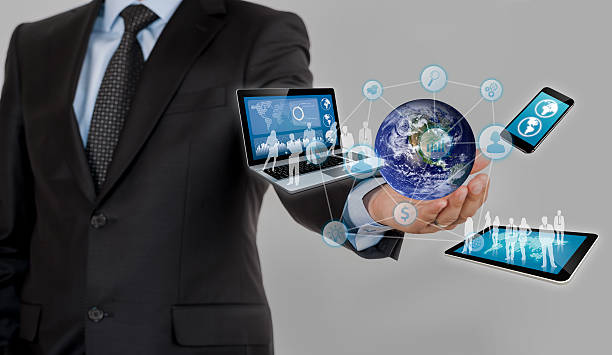 istock Businessman holds modern technology in hands 518057080