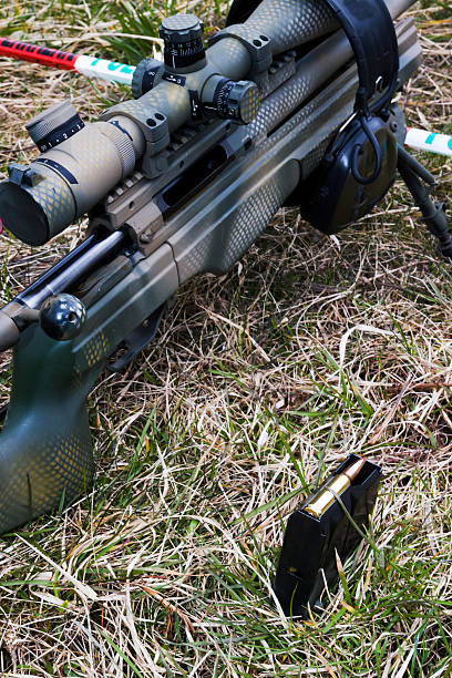 istock Military sniper aims at a target 518057914