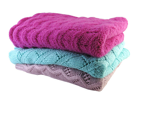 istock Pile of colorful clothes over white background 518058450
