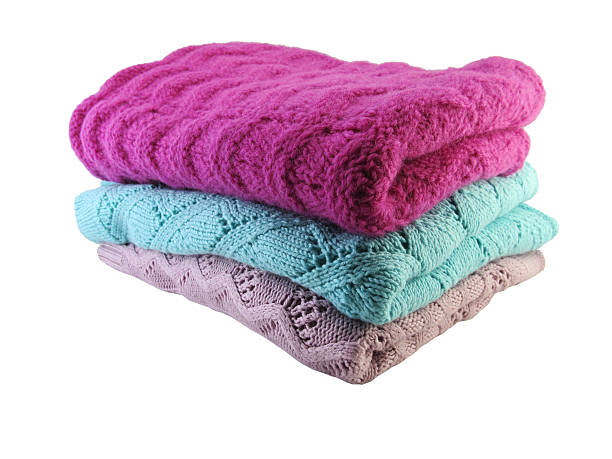 istock Pile of colorful clothes over white background 518058504