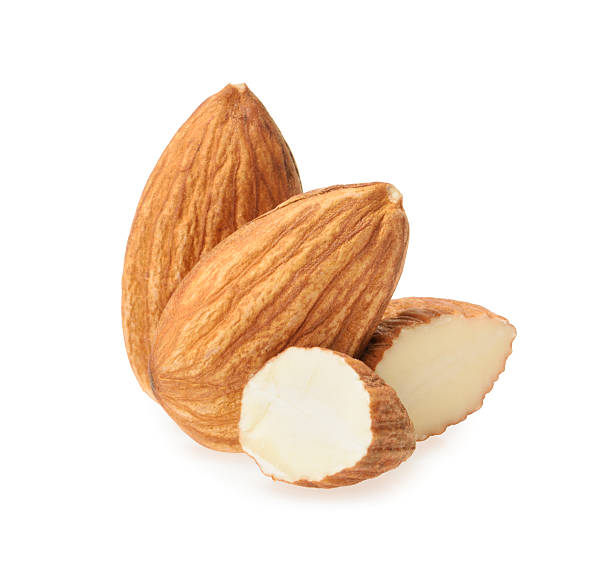istock Almond nuts isolated on white background 518058634
