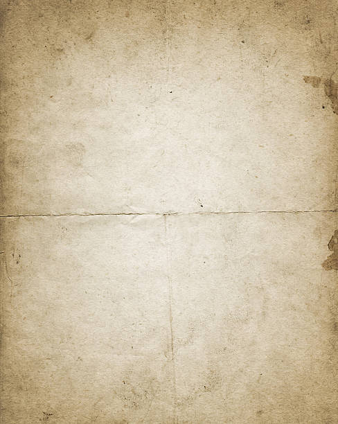 istock Old stained and crumpled paper texture. 518058840