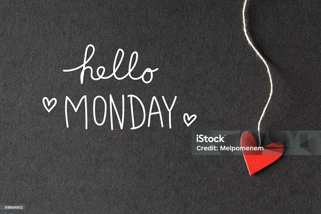 Hello Monday message with paper hearts Hello Monday message with handmade small paper hearts Monday Stock Photo