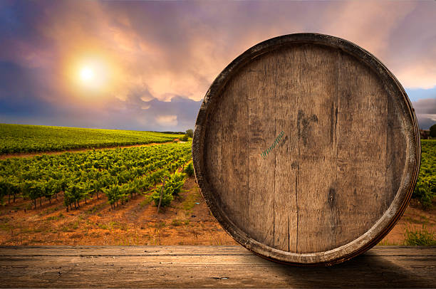 istock wine glass on wodden barrel 518065136