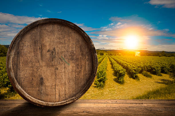 istock wine glass on wodden barrel 518065178