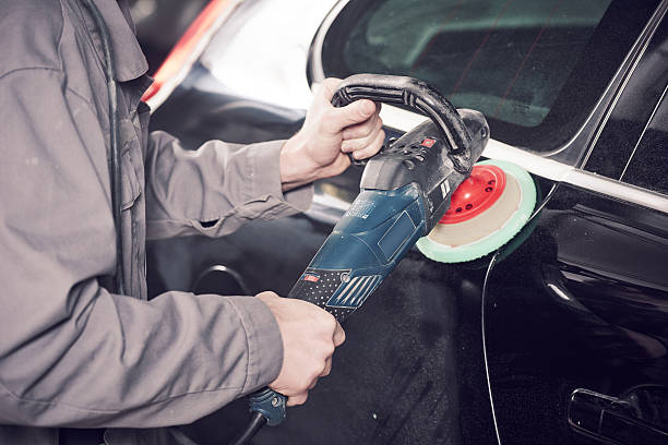 istock auto mechanic buffing car autobody 518065250