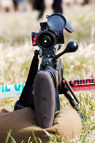 istock Military sniper aims at a target 518066718