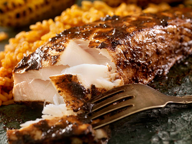 BBQ Grilled Halibut with Jerk BBQ Sauce BBQ Grilled Halibut with Jerk BBQ Sauce, Rice and Corn- Photographed on Hasselblad H3D2-39mb Camera sebastinae photos stock pictures, royalty-free photos & images