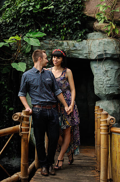 istock Couple on a walk in romantic place botanical garden 518067218