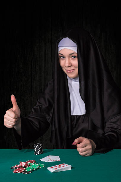 Nuns Gambling Stock Photos, Pictures & Royalty-Free Images - iStock