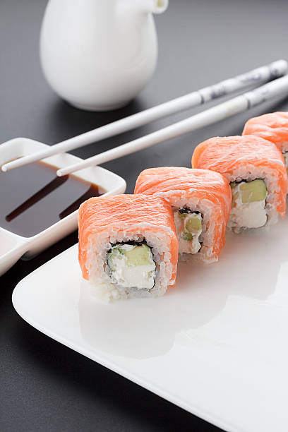 istock Japanese cuisine. Sushi. Black background. 518070346
