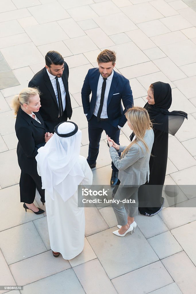 Business team in Middle East A group of business professionals are discussing business. Higher angle view. Business Stock Photo