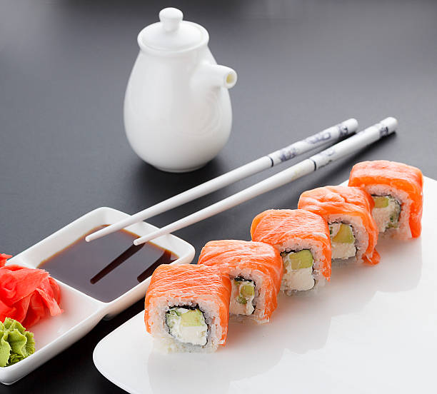 istock Japanese cuisine. Sushi. Black background. 518084546