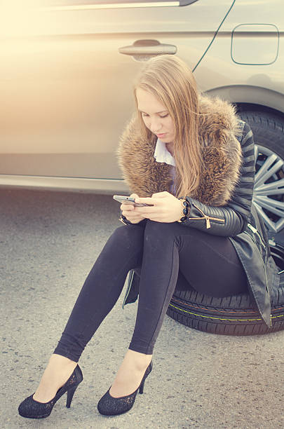 istock Woman makes a call. Car accident 518085784