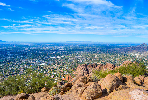 Looking down on Phoenix, Arizona from the top of Camelback Mountain on a beautiful day