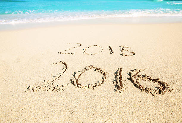 istock Celebrating 2016 on a tropical beach 518087136