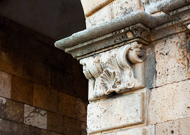 istock Antique fragment in a medieval roman building 518089318