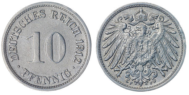 istock 10 pfennig 1912 coin isolated on white background, Germany 518089532