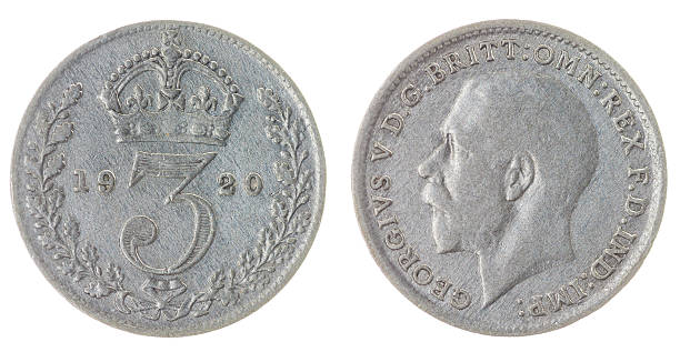 istock 3 pence 1920 coin isolated on white background, Great Britain 518089830