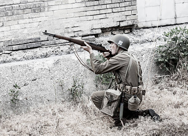 istock Soldier Aiming a Rifle WWII 518090714
