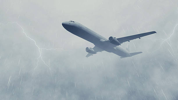 istock Airliner in a stormy sky with lightnings 518091210
