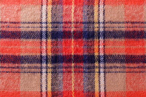 Soft scarf fabric with plaid pattern closeup texture