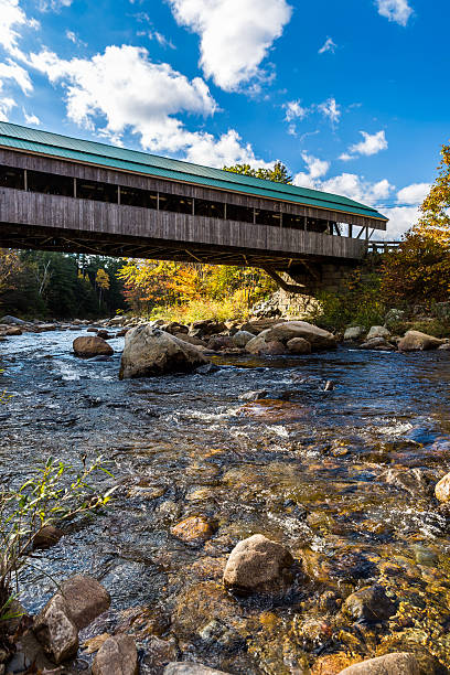istock Covered Bridge in Autumn, New Hampshire, USA 518094319