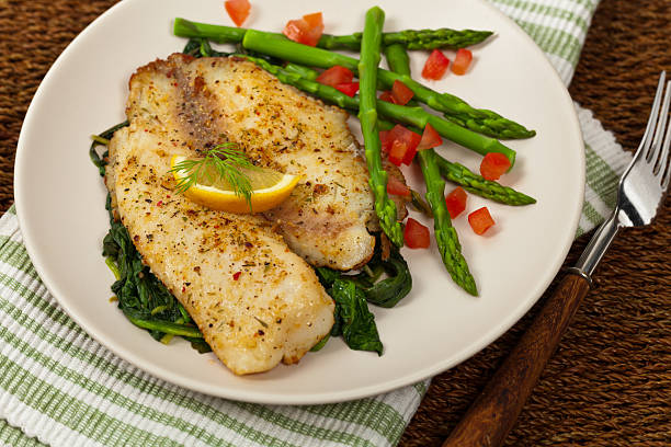 焼きたての魚の切り身 - prepared fish tilapia fillet seafood ストックフォトと画像