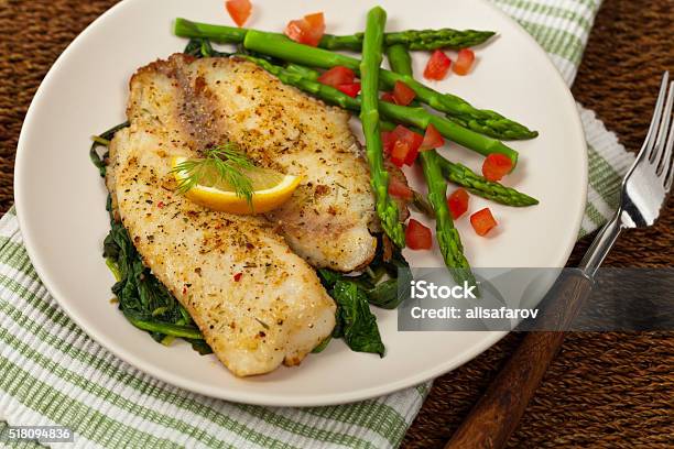 Baked Fish Fillet Stock Photo - Download Image Now - Tilapia, Lemon - Fruit, Cooked