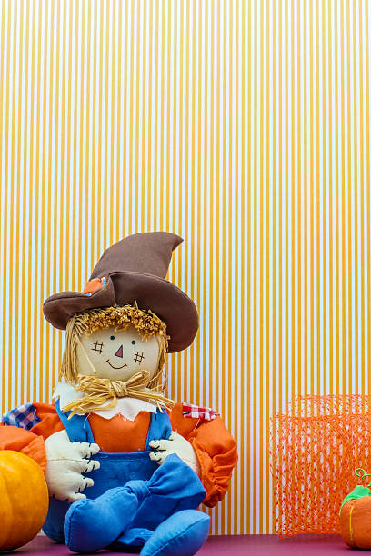 istock Seated Scarecrow Holding Its Britches 518095491