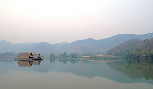 istock cottage in lake with sky background 518095936