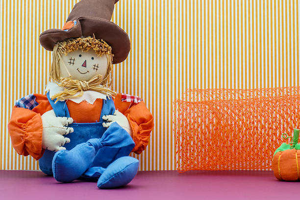 istock Seated Scarecrow Holding Its Britches 518096257