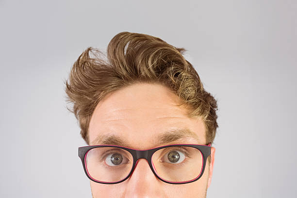 istock Geeky businessman looking at camera 518098223