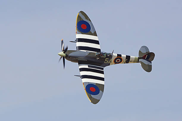 Airplane Vintage Britain WWII Spitfire Lancaster, California,USA- March 19,2016. Spitfire Britain vintage WWII airplane flying at 2016 Los Angeles Air Show in California. The 2016 Los Angeles air show features the Navy Blue Angels and military aircraft flying for the general public. spitfire stock pictures, royalty-free photos & images