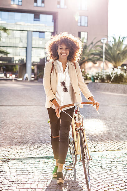 istock Happy woman ready to drive her cycle 518099722