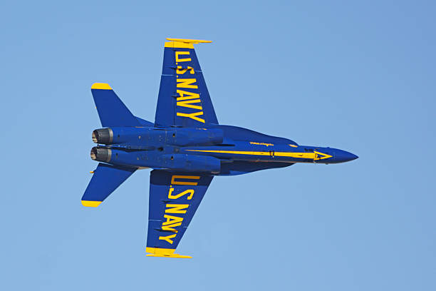 El Centro, California,USA- March 12,2016. Blue Angels F-18 jet fighters performing stunts at 2016 El Centro Air Show in California. The Navy Blue Angels 2016 Show schedule begins at El Centro and runs through November 11-12, 2016 ending at NAS Pensacola, FL.