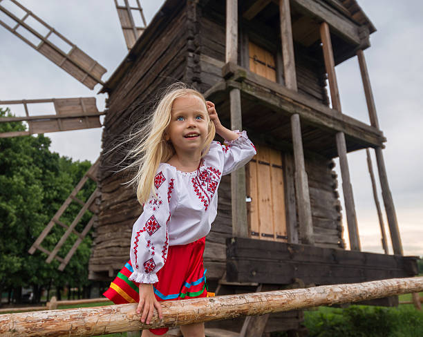 antigo moinho de ucrânia e rapariga - factory human hair blue little girls imagens e fotografias de stock