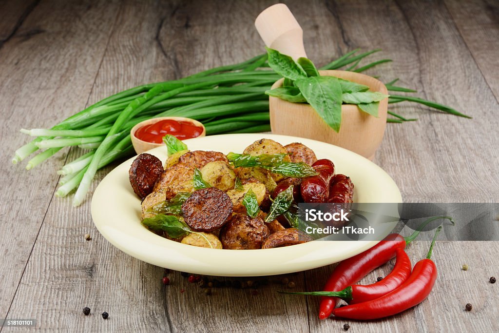 New roasted baked potatoe in the bowl New roasted baked potatoe in the bowl with vegetables Cultures Stock Photo