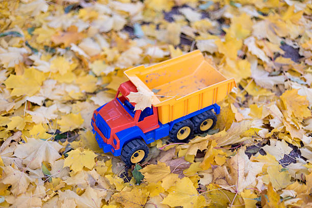 istock Toy car truck outdoors autumn 518101207