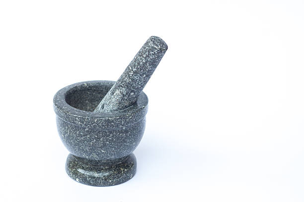 istock Stone mortar and pestle on white background 518109436