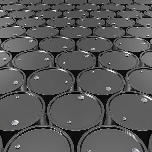 istock Black Metal Oil Barrels Background. 518112774
