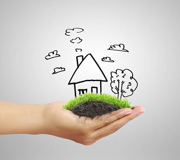 istock Business man house in  hands 518113122
