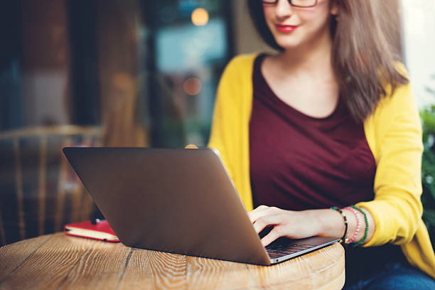 istock Woman Laptop Browsing Searching Social Networking Technology Con 518113604