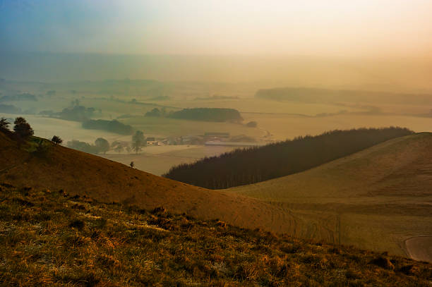 istock Foggy sunrise - View from Cley Hill 518114256
