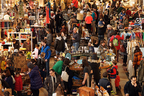 New York, U.S.A - March 29, 2013: People Shopping at Brooklyn Flea market inside the Main Hall of Williamsburgh Savings Bank Building at 1 Hanson Place