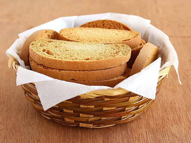 Healthy snack rusk, made from whole-wheat flour, in a basket.