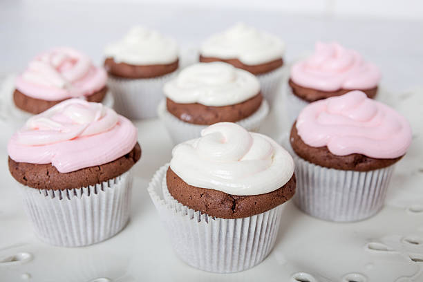 istock Cupcakes with sour cream frosting on top 518120428
