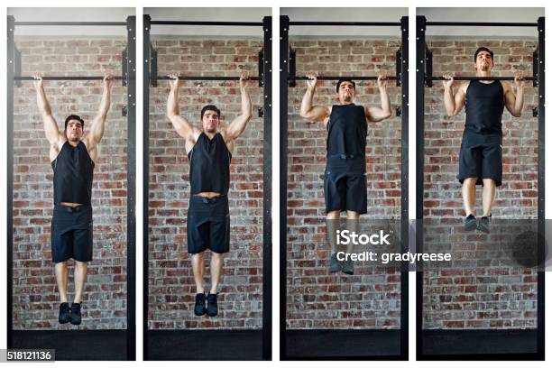 Making Gains Stock Photo - Download Image Now - Chin-Ups, Gym, Health Club